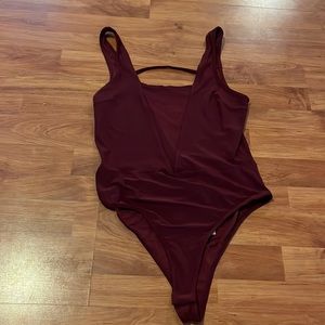 Forever 21 Deep v-neck body suit